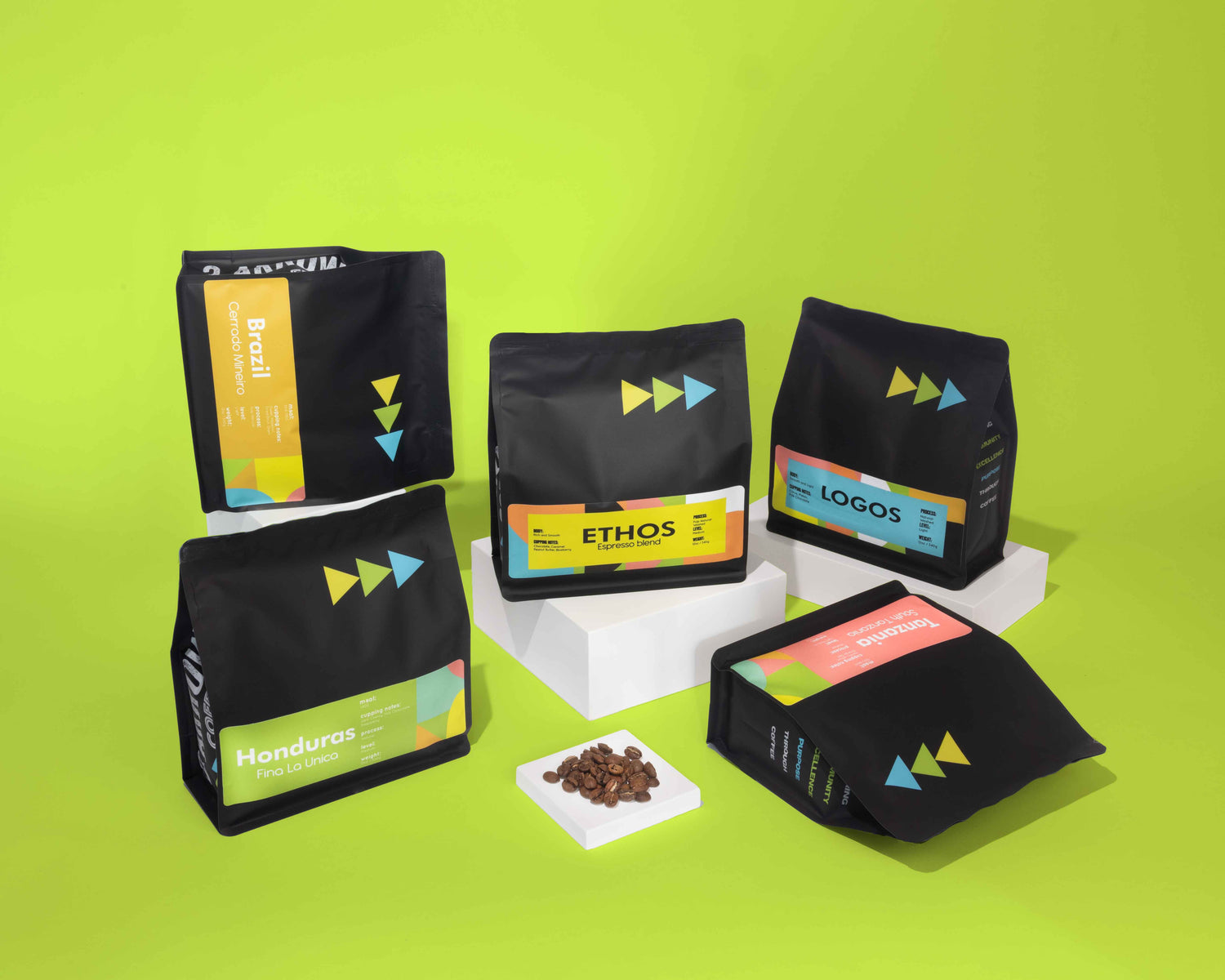 3 Arrows Coffee Company blends and single-origin coffee bags — Ethos, Pathos, Logos, Honduras, Brazil